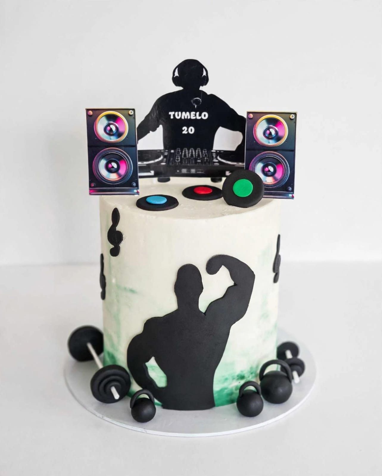 Silhouette gym themed cake with fondant weights